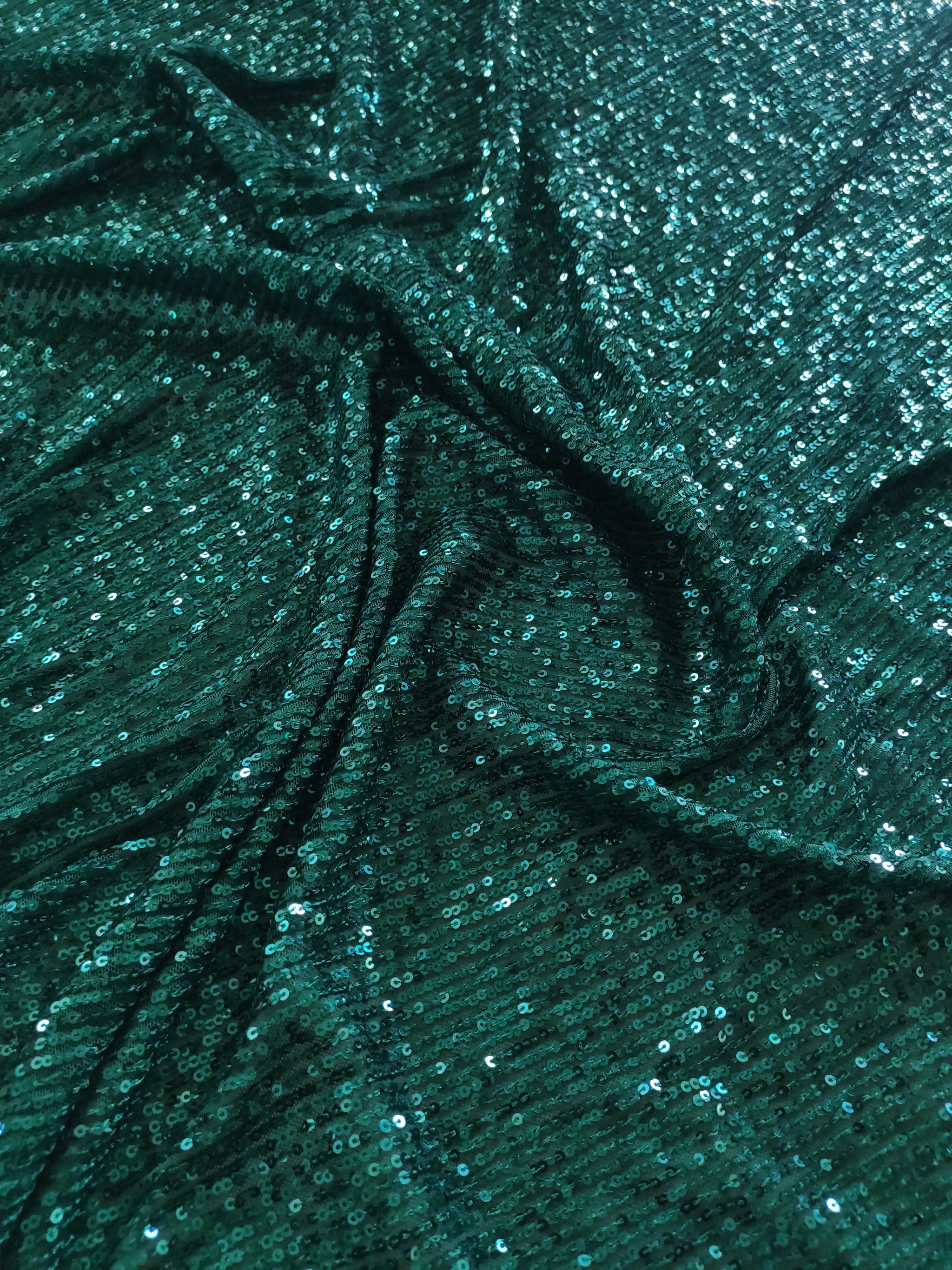 Bottle Green Sequin embroidered on Imported Lycra net