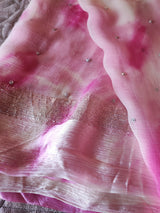 Pink Chiffon saree with silver Zari border.
