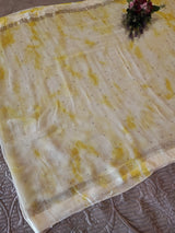 Yellow Chiffon saree with silver Zari border.