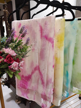 Yellow Chiffon saree with silver Zari border.