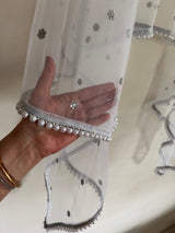 White Net dupatta with white moti border.