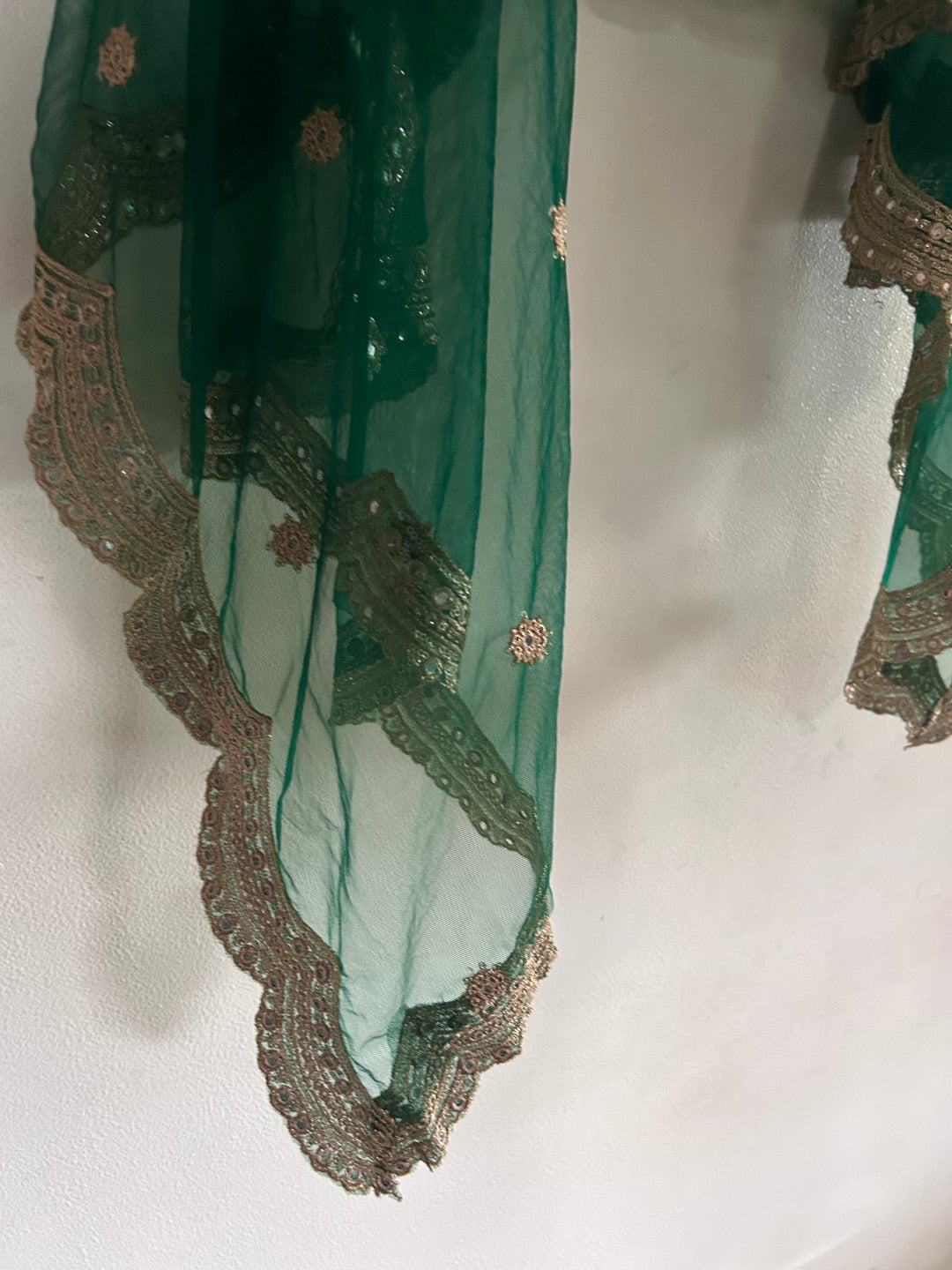 Bottle green net dupatta with scallop border