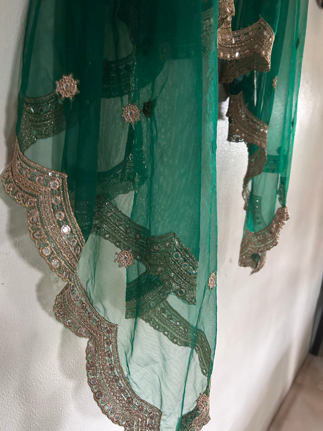Bottle green net dupatta with scallop border