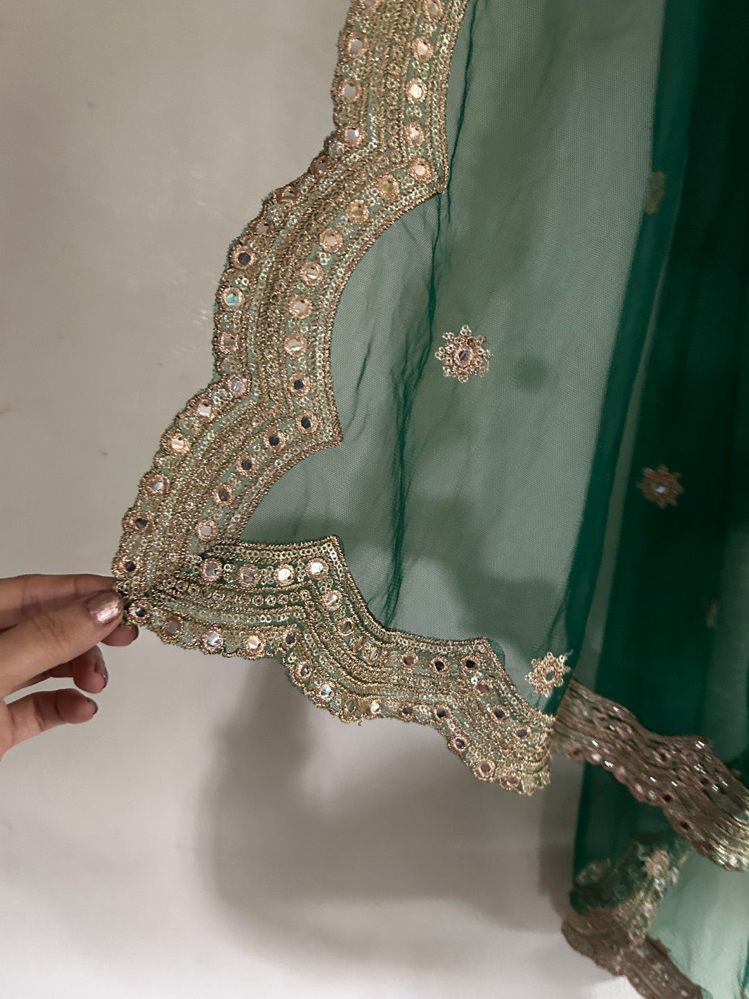 Bottle green net dupatta with scallop border
