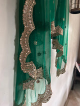 Bottle green net dupatta with scallop border