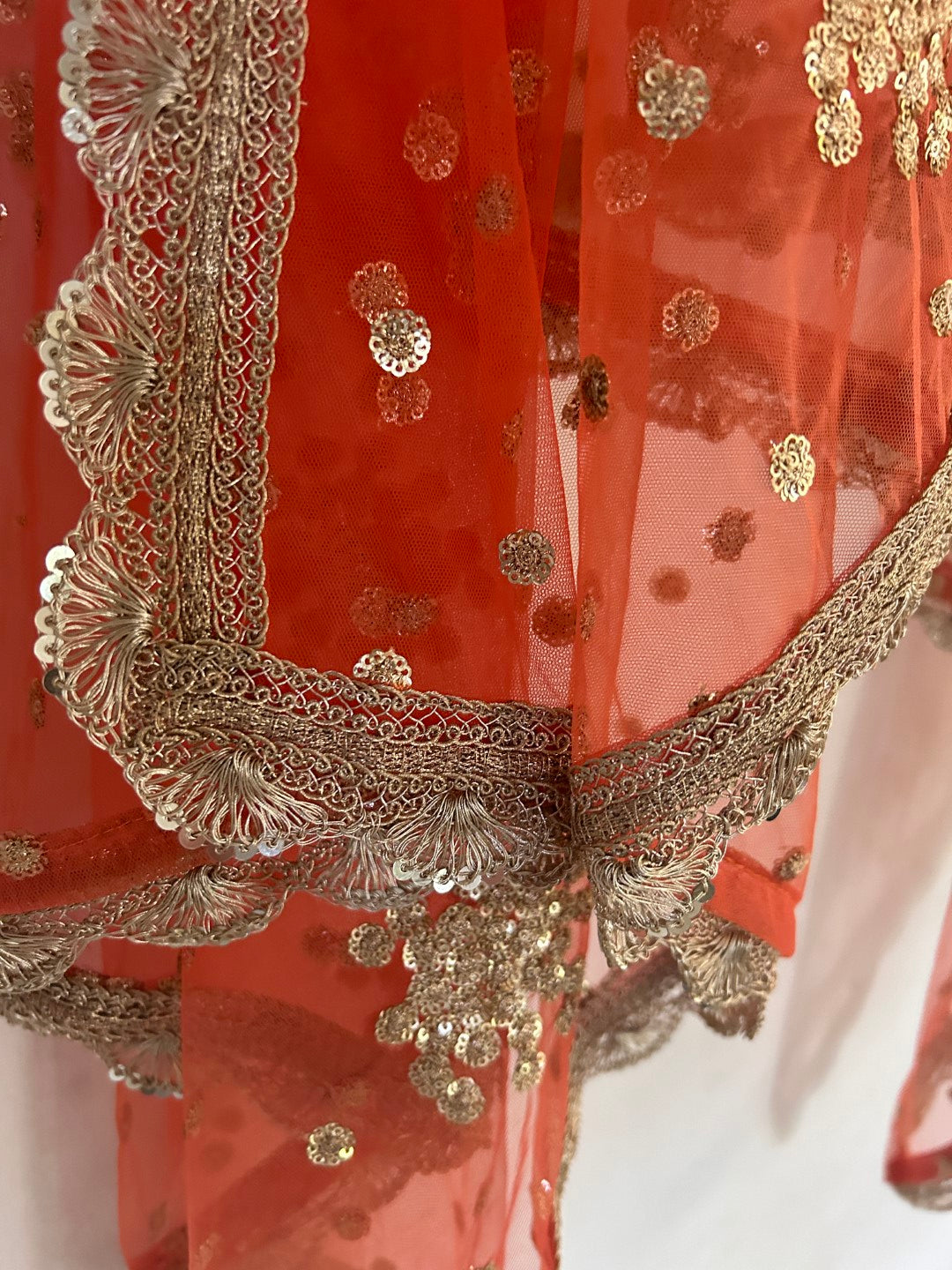 Orange Net dupatta with golden border