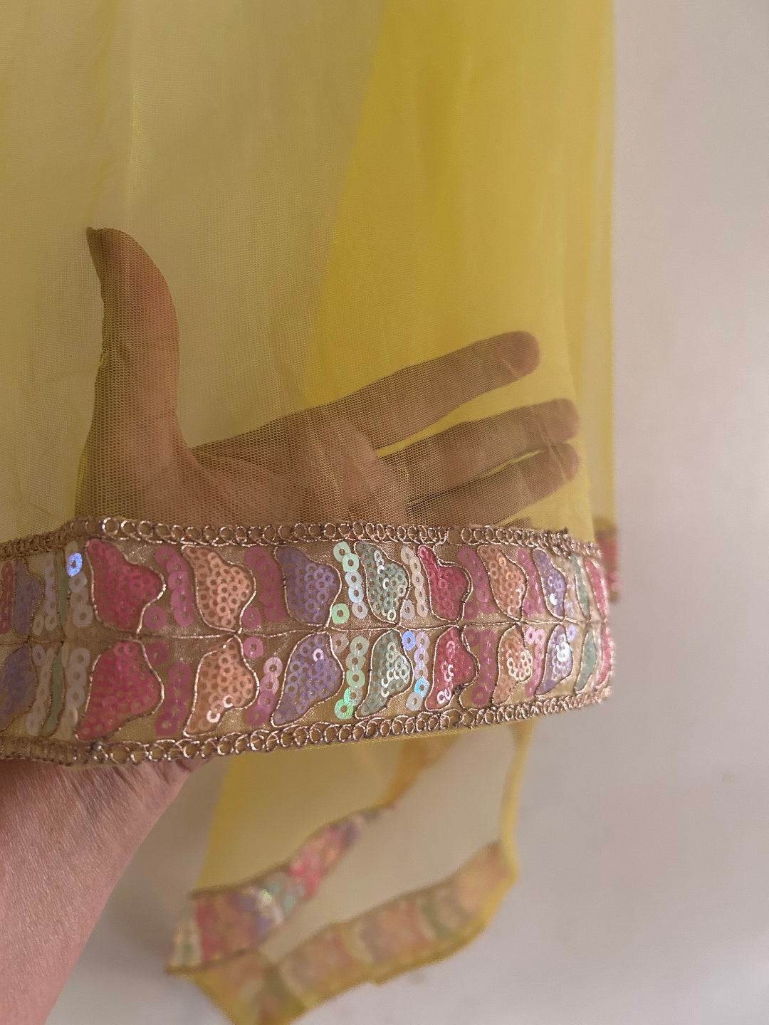 Yellow Net dupatta with multi color border