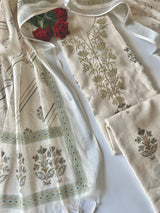 Elegant light cream dress material featuring traditional pitta work and soft breathable mul linen fabric