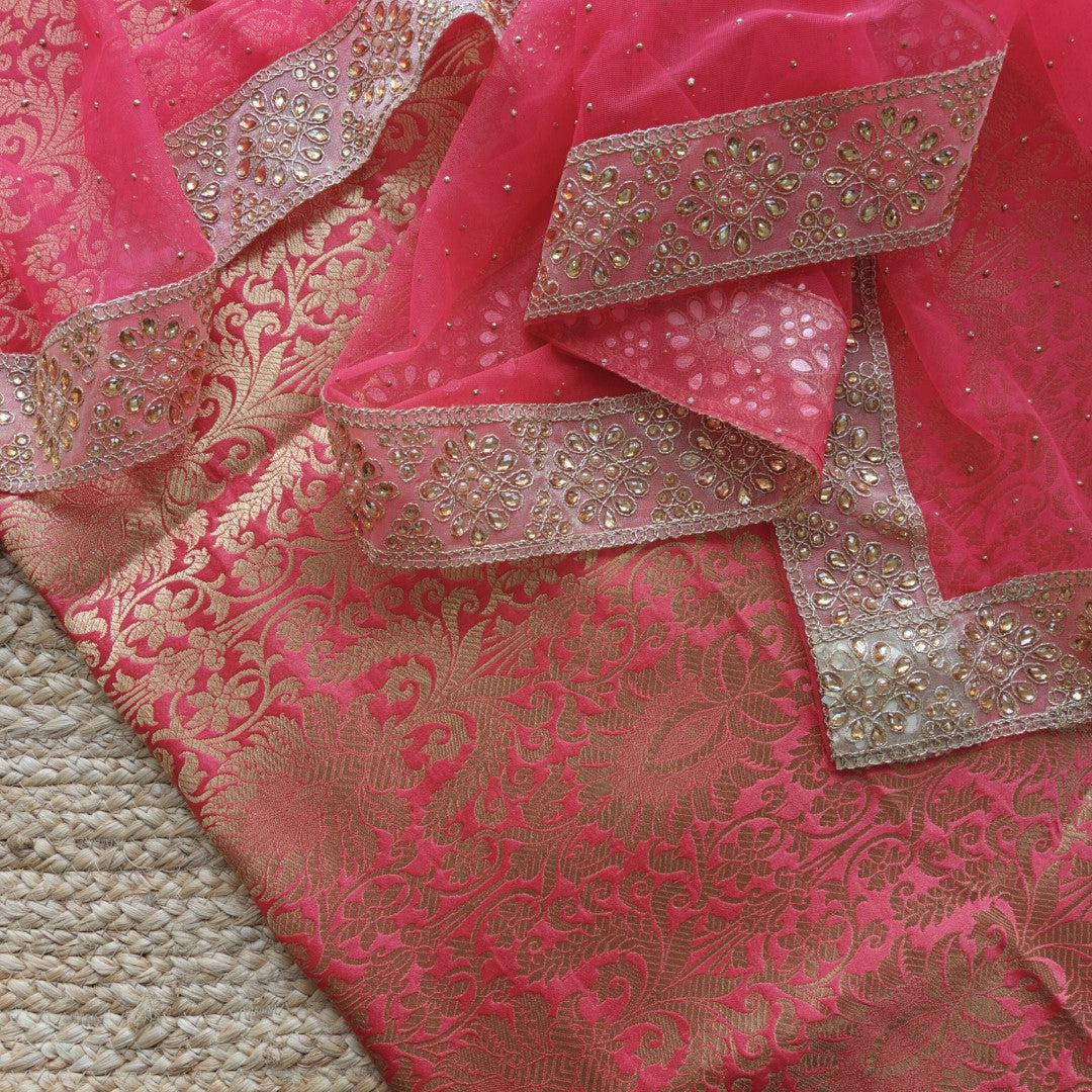 Premium ethnic dress material with woven brocade fabric and stylish glitter net dupatta