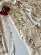 Women’s cream ethnic dress material with graceful all over prints and refined mul linen texture
