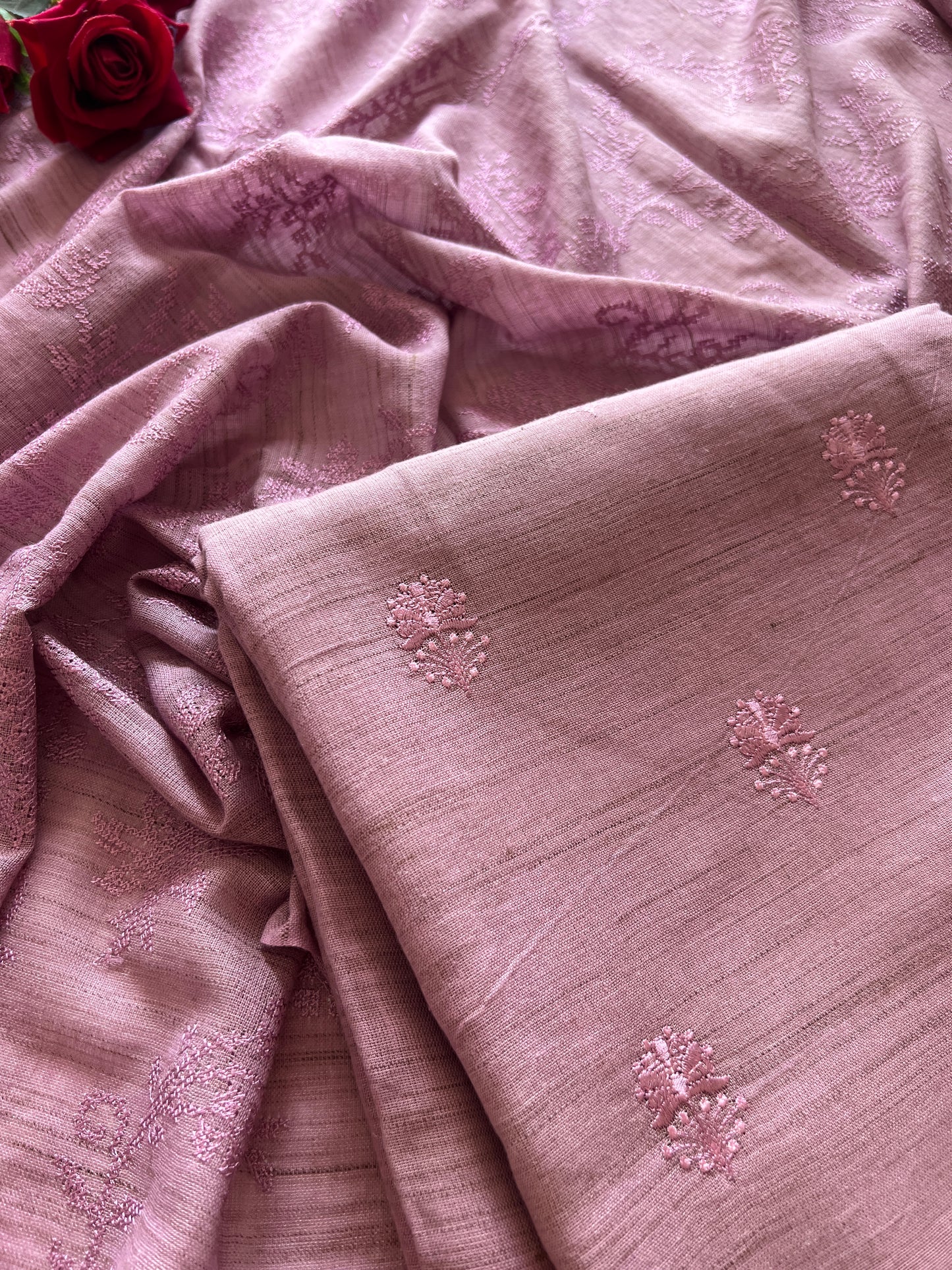 Premium lilac cotton dress material featuring monochrome self embroidery and graceful ethnic styling