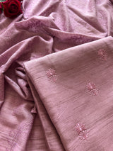 Premium lilac cotton dress material featuring monochrome self embroidery and graceful ethnic styling