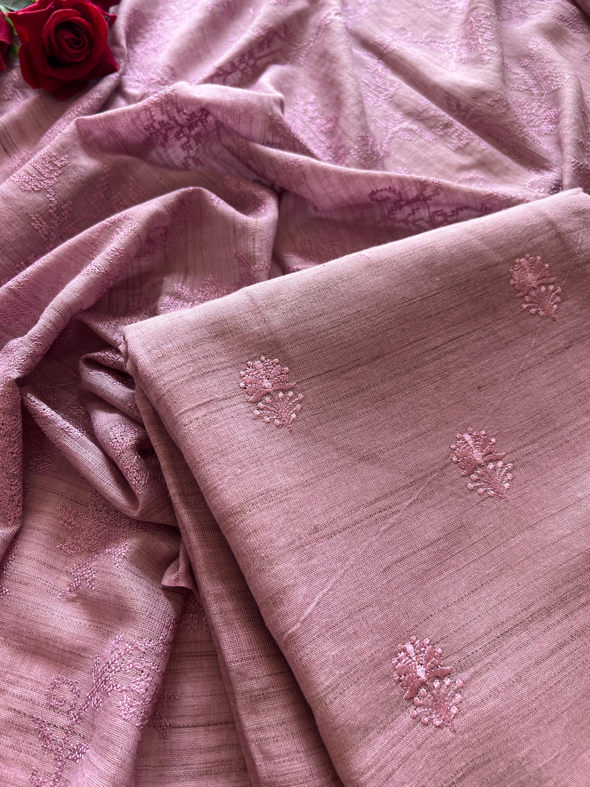 Premium lilac cotton dress material featuring monochrome self embroidery and graceful ethnic styling