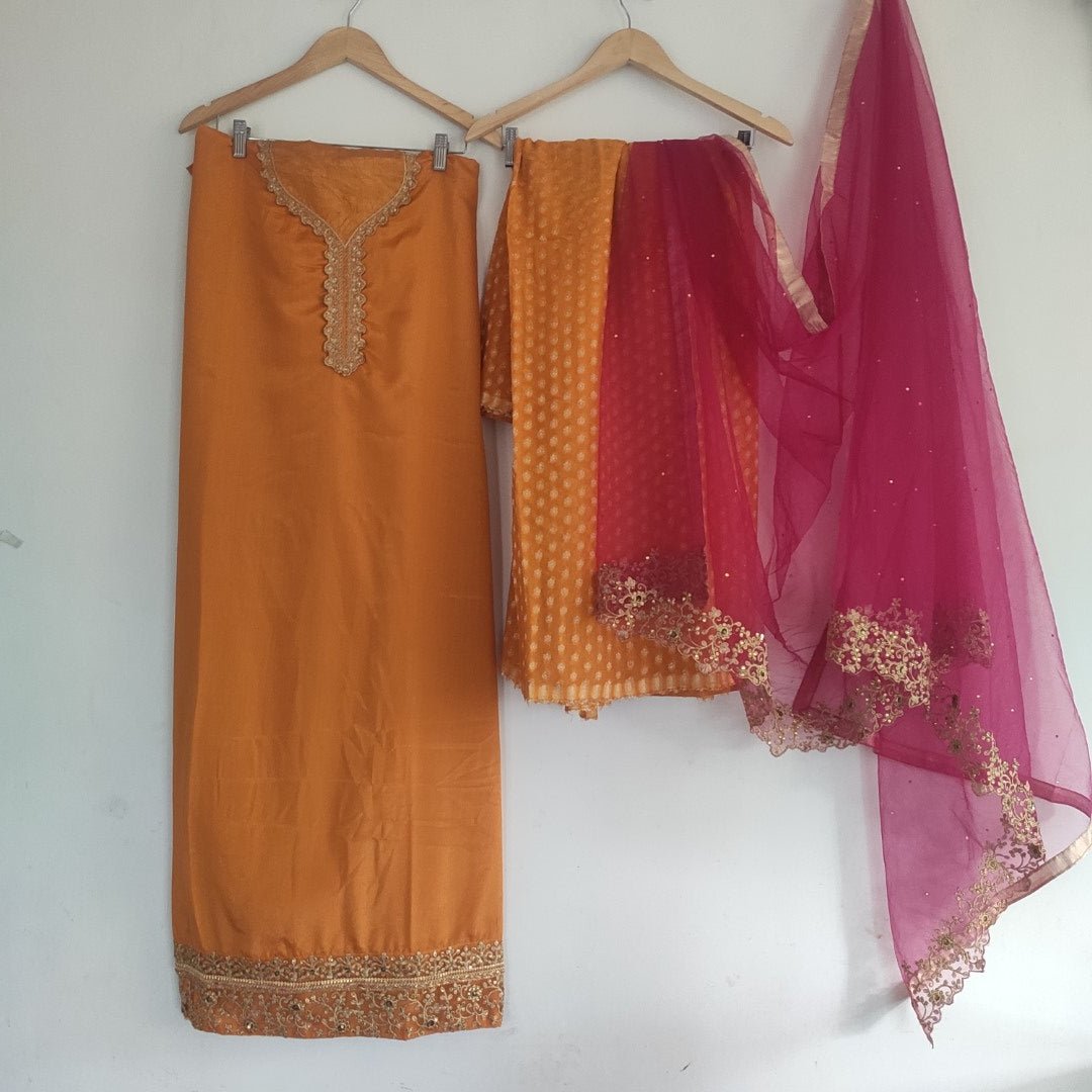 Mustard yellow with pink dupatta dress material. - Neel Creations By Saanvi