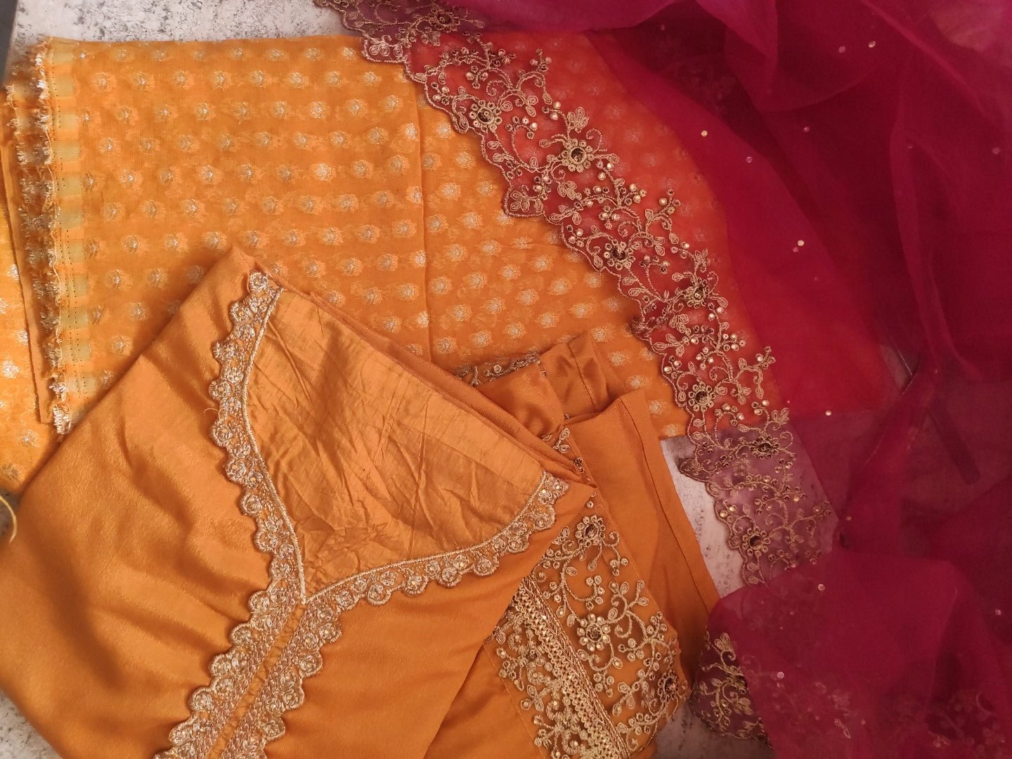 Mustard yellow with pink dupatta dress material. - Neel Creations By Saanvi