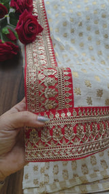 Off white Saree with Red border. Traditional sari