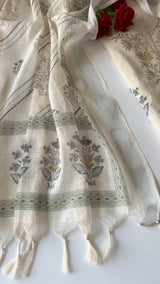 Elegant light cream mul linen unstitched salwar suit material featuring delicate pitta work and graceful all over prints. Perfect for sophisticated everyday and festive ethnic wear.