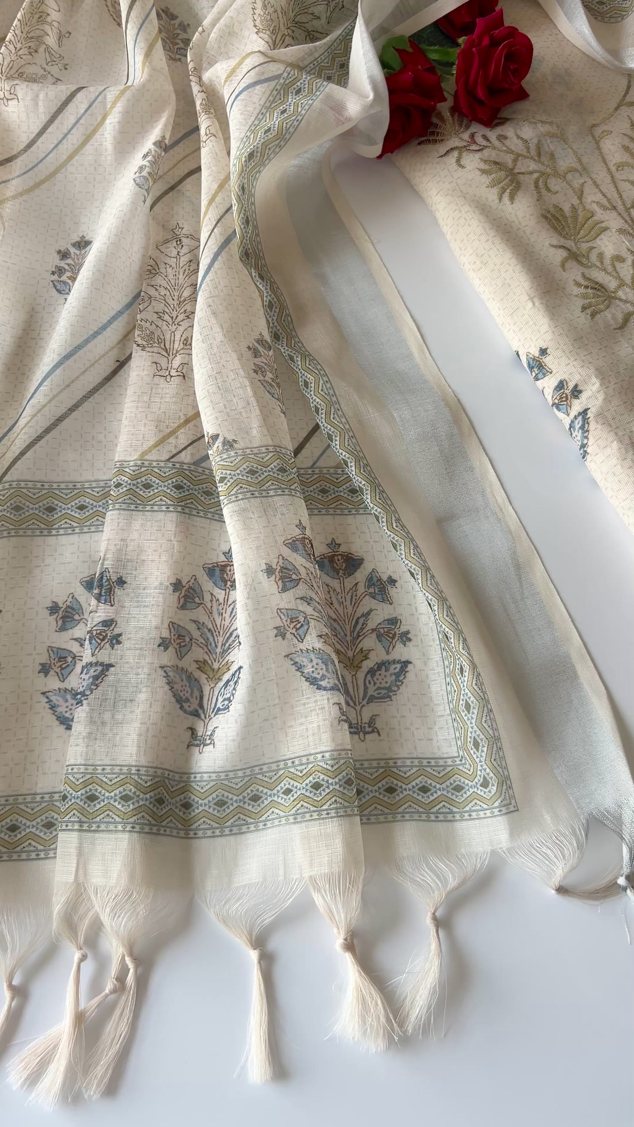 Elegant light cream mul linen unstitched salwar suit material featuring delicate pitta work and graceful all over prints. Perfect for sophisticated everyday and festive ethnic wear.
