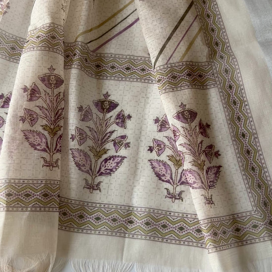 Elegant light cream mul linen unstitched salwar suit material featuring delicate pitta work and graceful all over prints. Perfect for sophisticated everyday and festive ethnic wear.