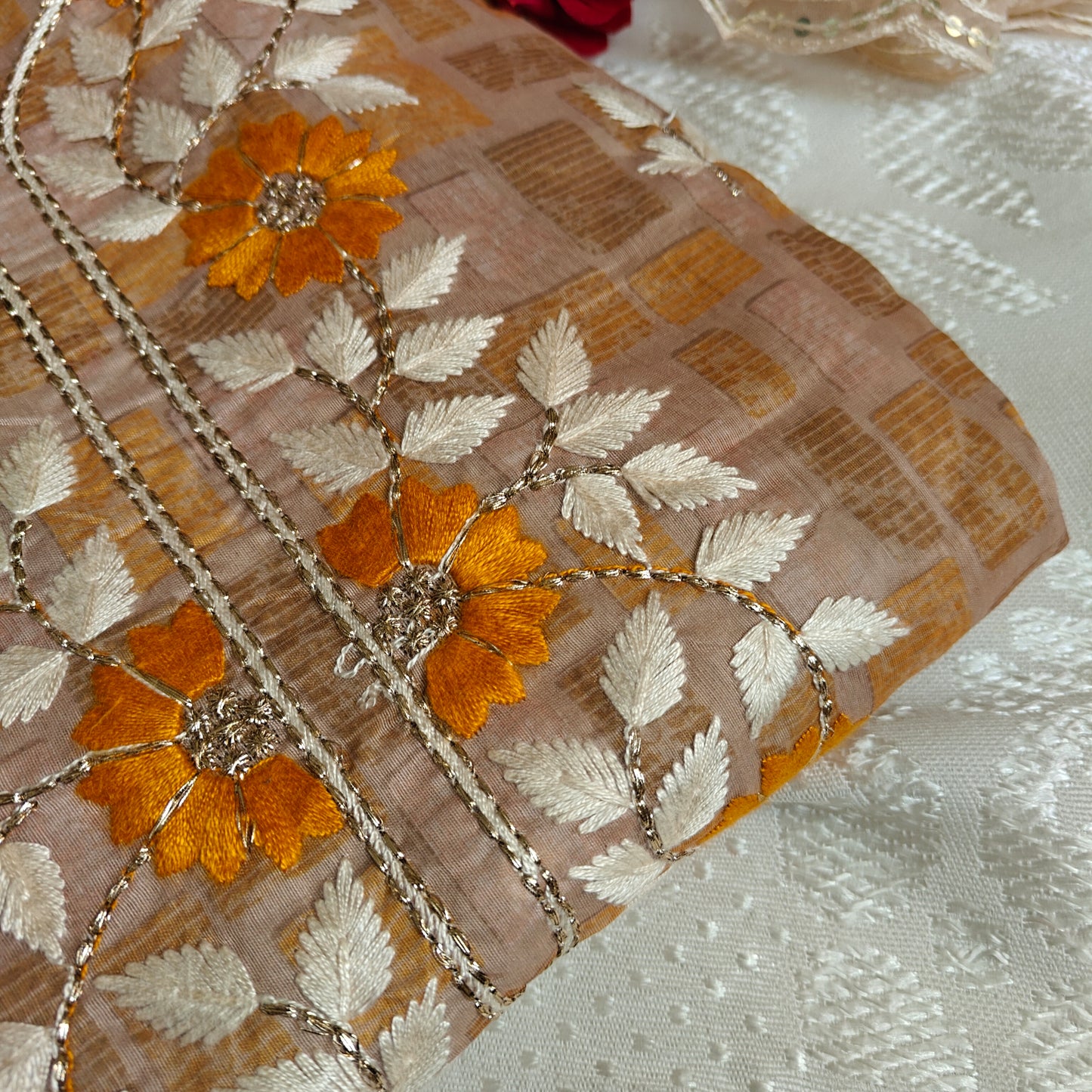 Dress material with neck embroidery