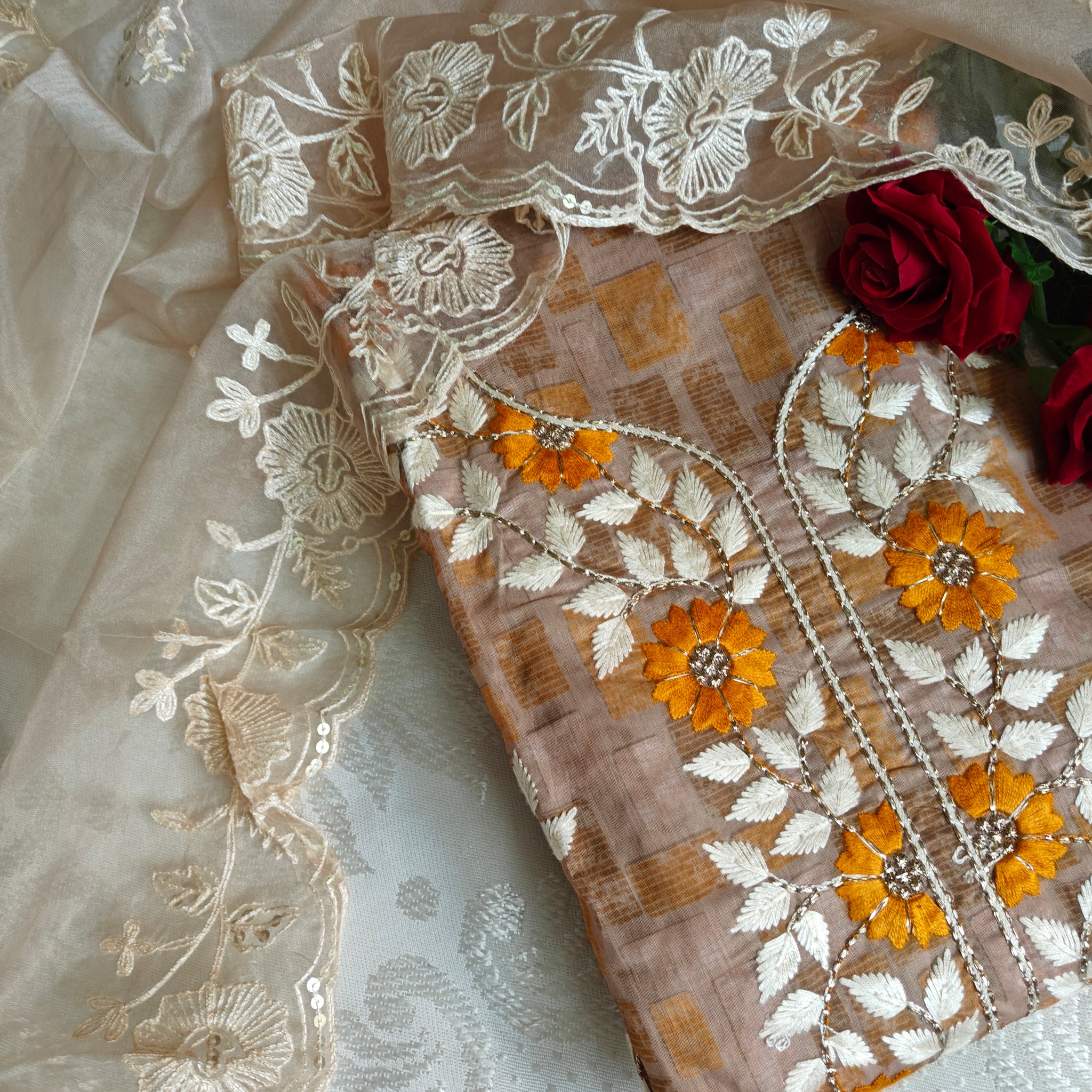 Dress material with neck embroidery