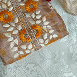 Dress material with neck embroidery