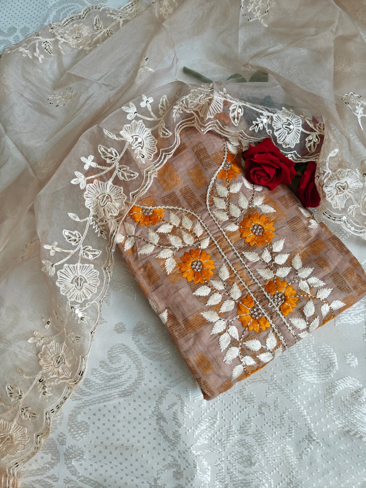 Dress material with neck embroidery