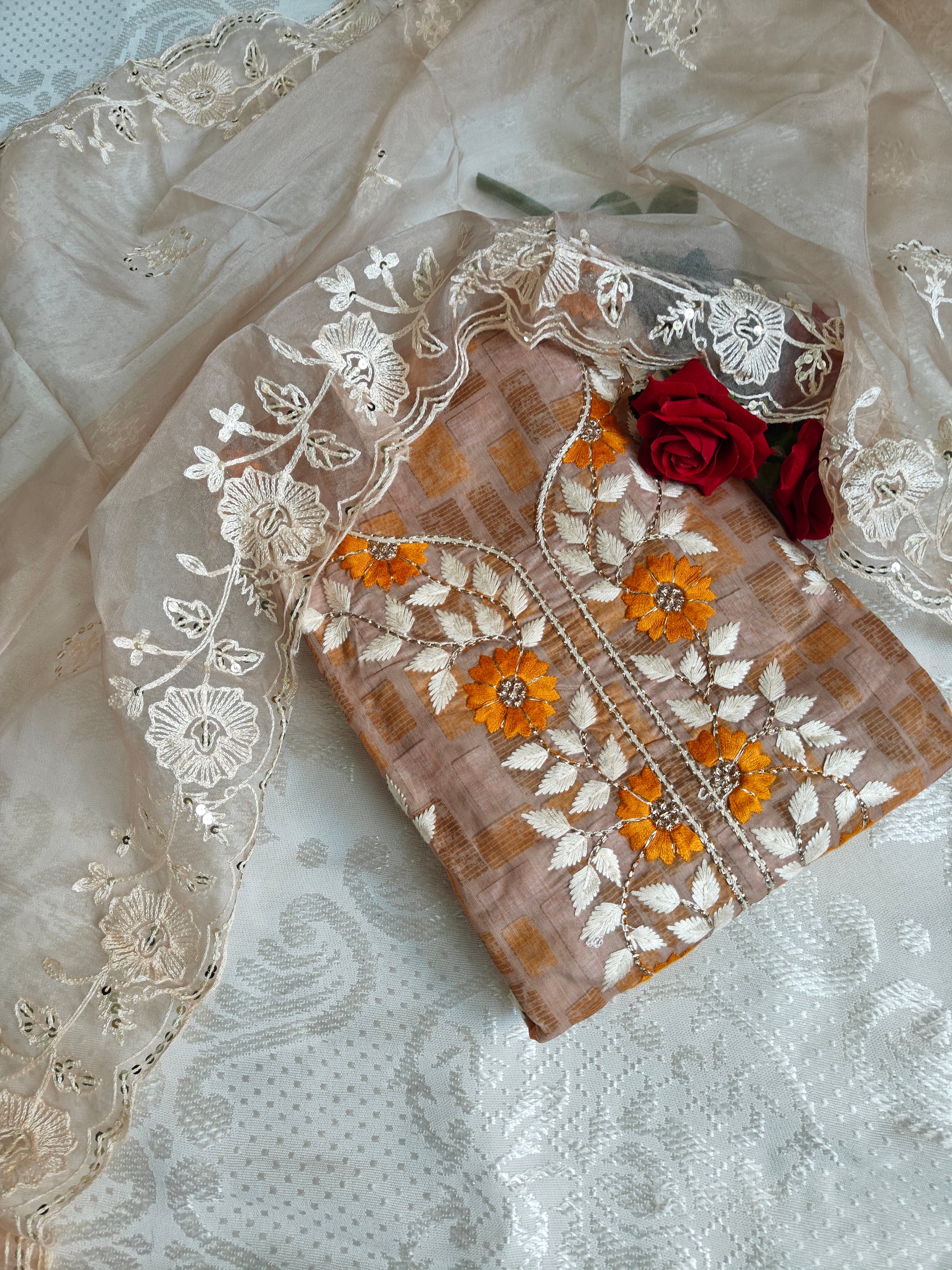 Dress material with neck embroidery